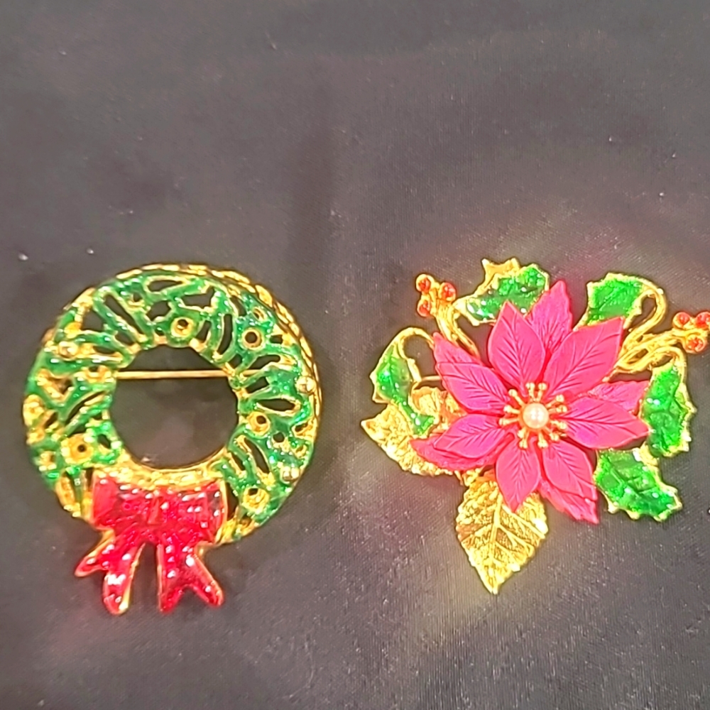 Two Christmas brooch one marked kc on it for budget price